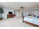 Large bedroom with plush carpet and mountain views at 3428 N Park St, Buckeye, AZ 85396