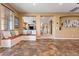 Cozy breakfast nook with built-in bench seating and view to Gathering room at 3428 N Park St, Buckeye, AZ 85396