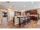 Gourmet kitchen with dark wood cabinets and granite counters at 3428 N Park St, Buckeye, AZ 85396