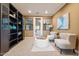 Home office with built-in shelving and window seat at 3428 N Park St, Buckeye, AZ 85396