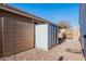 Backyard with storage shed and block wall at 22651 E Creosote Dr, Queen Creek, AZ 85142