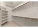 Large walk-in closet with ample shelving and hanging space at 4584 E Chisum Trl, Phoenix, AZ 85050