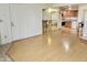 Inviting living room area featuring hardwood floors and convenient access to the kitchen space at 4901 S Calle Los Cerros Dr # 202, Tempe, AZ 85282
