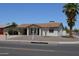 Cozy single-story home with desert landscaping and a mature palm tree that enhances curb appeal at 5255 S Mill Ave, Tempe, AZ 85283