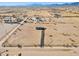 Aerial view of house on a large desert lot at 53275 W Adele Rd, Maricopa, AZ 85139