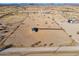Aerial view of house on a large desert lot at 53275 W Adele Rd, Maricopa, AZ 85139