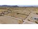 Aerial view of property showing a mobile home and large lot in a desert setting at 53275 W Adele Rd, Maricopa, AZ 85139