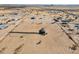 Aerial view showing a single-Gathering home on a large lot in a rural setting at 53275 W Adele Rd, Maricopa, AZ 85139