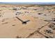 Aerial view of a single-Gathering home on a large lot with desert landscaping at 53275 W Adele Rd, Maricopa, AZ 85139