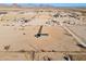 Aerial view of house on a large desert lot at 53275 W Adele Rd, Maricopa, AZ 85139