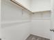 Walk-in closet with double hanging rods at 53275 W Adele Rd, Maricopa, AZ 85139
