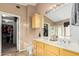 Double vanity bathroom with large mirror and ample storage at 553 E Kyle Ct, Gilbert, AZ 85296