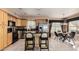 Kitchen island with granite countertops and stainless steel appliances at 553 E Kyle Ct, Gilbert, AZ 85296