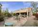 Landscaped backyard with patio and seating at 5951 E Trailridge St, Mesa, AZ 85215