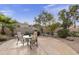 Spacious backyard patio with seating area, perfect for outdoor entertaining at 5951 E Trailridge St, Mesa, AZ 85215