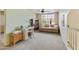 Bonus room with an abundance of light, perfect as a home office or playroom at 5951 E Trailridge St, Mesa, AZ 85215