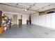 Garage with overhead storage and shelving at 5951 E Trailridge St, Mesa, AZ 85215