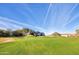 Golf course putting green with sand traps at 5951 E Trailridge St, Mesa, AZ 85215