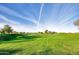 Expansive view of a beautifully landscaped golf course at 5951 E Trailridge St, Mesa, AZ 85215