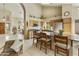 Well-lit kitchen showcases a breakfast bar, stainless steel appliances, and granite countertops at 5951 E Trailridge St, Mesa, AZ 85215