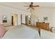 Spacious main bedroom with ensuite bathroom, walk-in closet, and stairs to the first floor at 5951 E Trailridge St, Mesa, AZ 85215