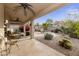 Relaxing covered patio with seating area at 5951 E Trailridge St, Mesa, AZ 85215
