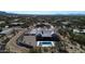 Sprawling community featuring a modern home, a sparkling pool, and desert landscaping at 8714 E Tether Trl, Scottsdale, AZ 85255