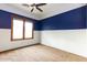 Spacious bedroom with two-toned walls and ceiling fan at 100 W Sparrow Dr, Chandler, AZ 85286