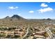 Aerial view of community, showcasing surrounding desert landscape and mountain views at 11714 N 134Th St, Scottsdale, AZ 85259