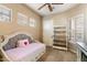 Cozy bedroom with a daybed and built-in shelving at 11714 N 134Th St, Scottsdale, AZ 85259