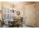 Cozy breakfast nook with a round table and four chairs, perfect for morning meals at 11714 N 134Th St, Scottsdale, AZ 85259