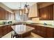 Gourmet kitchen with granite countertops and stainless steel appliances at 11714 N 134Th St, Scottsdale, AZ 85259