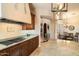 Modern kitchen with stainless steel appliances and ample counter space at 11714 N 134Th St, Scottsdale, AZ 85259