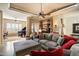 Spacious living room with comfortable seating and a view into an adjacent music room at 11714 N 134Th St, Scottsdale, AZ 85259