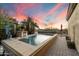 Inviting rectangular pool with fountains and dolphin statues at 11714 N 134Th St, Scottsdale, AZ 85259