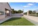 Artificial turf backyard with patio and block wall at 15091 N 90Th Dr, Peoria, AZ 85381