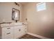 Bathroom featuring a vanity with sink and square mirror at 21165 W Carver Rd, Buckeye, AZ 85326
