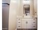 Bathroom vanity with modern fixtures, mirror, and overhead lighting at 21165 W Carver Rd, Buckeye, AZ 85326