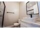 Clean bathroom with marble counters, contemporary fixtures, a vessel sink, and neutral walls at 21165 W Carver Rd, Buckeye, AZ 85326