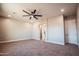 Expansive bedroom with ceiling fan offers a tranquil retreat; modern and inviting at 21165 W Carver Rd, Buckeye, AZ 85326