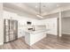 Modern kitchen featuring white cabinets and a large island at 21165 W Carver Rd, Buckeye, AZ 85326