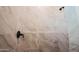 Modern shower features marble tile and black fixtures at 21165 W Carver Rd, Buckeye, AZ 85326