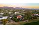 Aerial view of the house and surrounding mountain views at 22402 N 84Th Pl, Scottsdale, AZ 85255