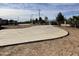 Large concrete driveway with curved design at 24201 N 181St Dr, Surprise, AZ 85387