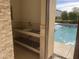 Poolside bathroom with sink and view of pool at 24201 N 181St Dr, Surprise, AZ 85387