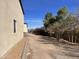 Landscaped side yard with trees and building at 24201 N 181St Dr, Surprise, AZ 85387