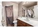 Bathroom with single vanity and shower/tub at 2535 N 87Th Ave, Phoenix, AZ 85037