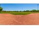 Well-maintained baseball field with lights at 26487 W Runion Dr, Buckeye, AZ 85396