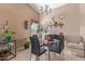 Charming dining area with a glass table and four chairs at 8934 W Ocotillo Rd, Glendale, AZ 85305