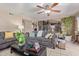 Spacious living room featuring a comfortable sofa and large windows at 8934 W Ocotillo Rd, Glendale, AZ 85305